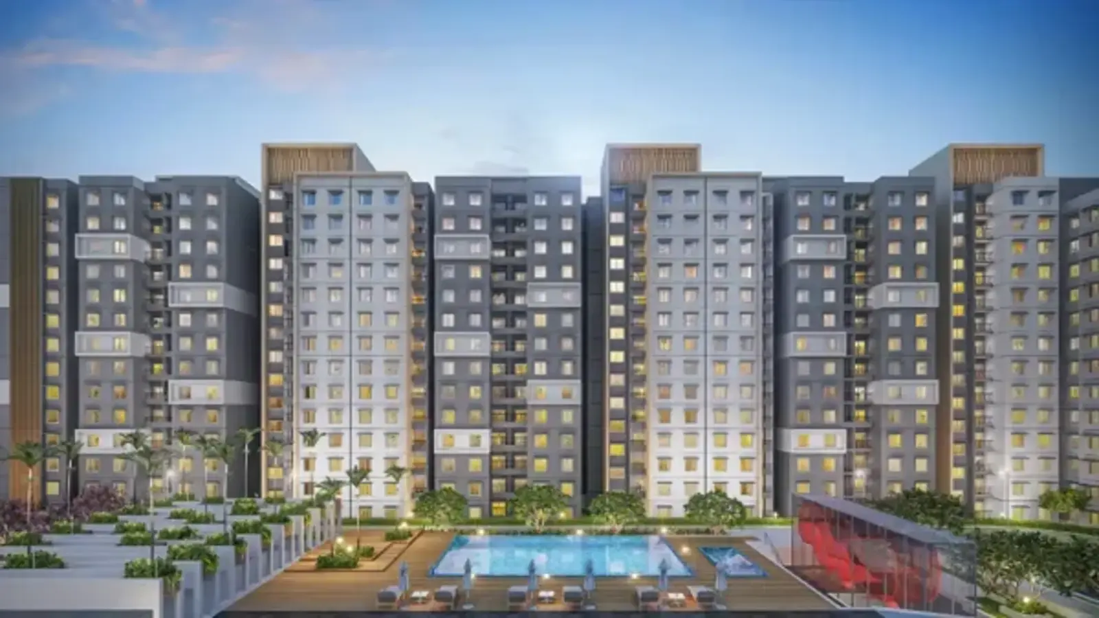 Purva District pool deck and towers at dusk